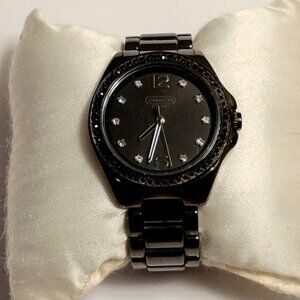 “Ladies Coach Ceramic Watch Excellent Condition. Will fit up to a 5 3/4" wrist.